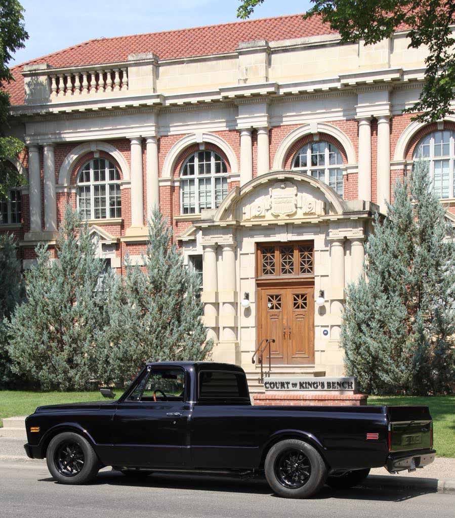 Your Paralegal Assist| Courthouse with a black truck in front of it